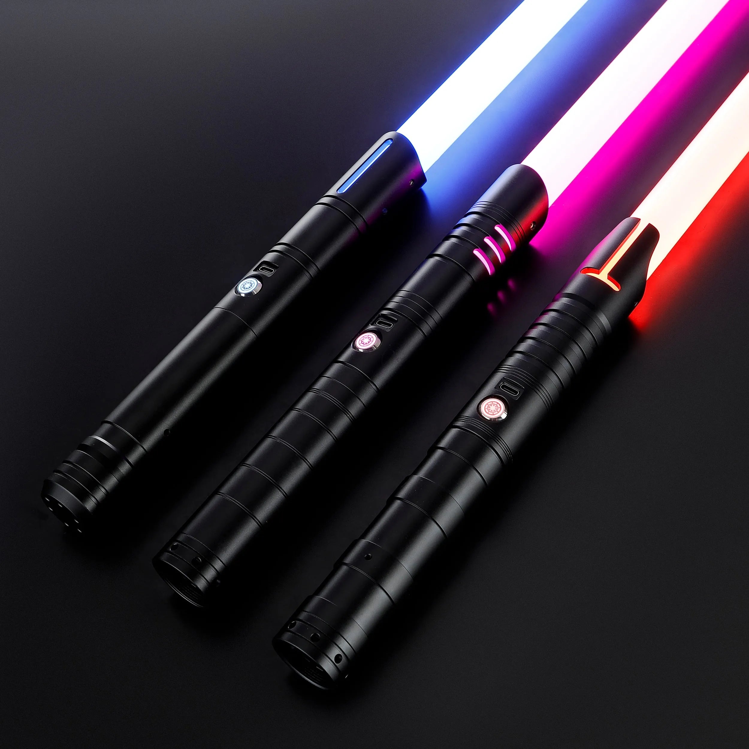 Three black T6 aluminum alloy dueling sabers with glowing white, blue, and red blades.