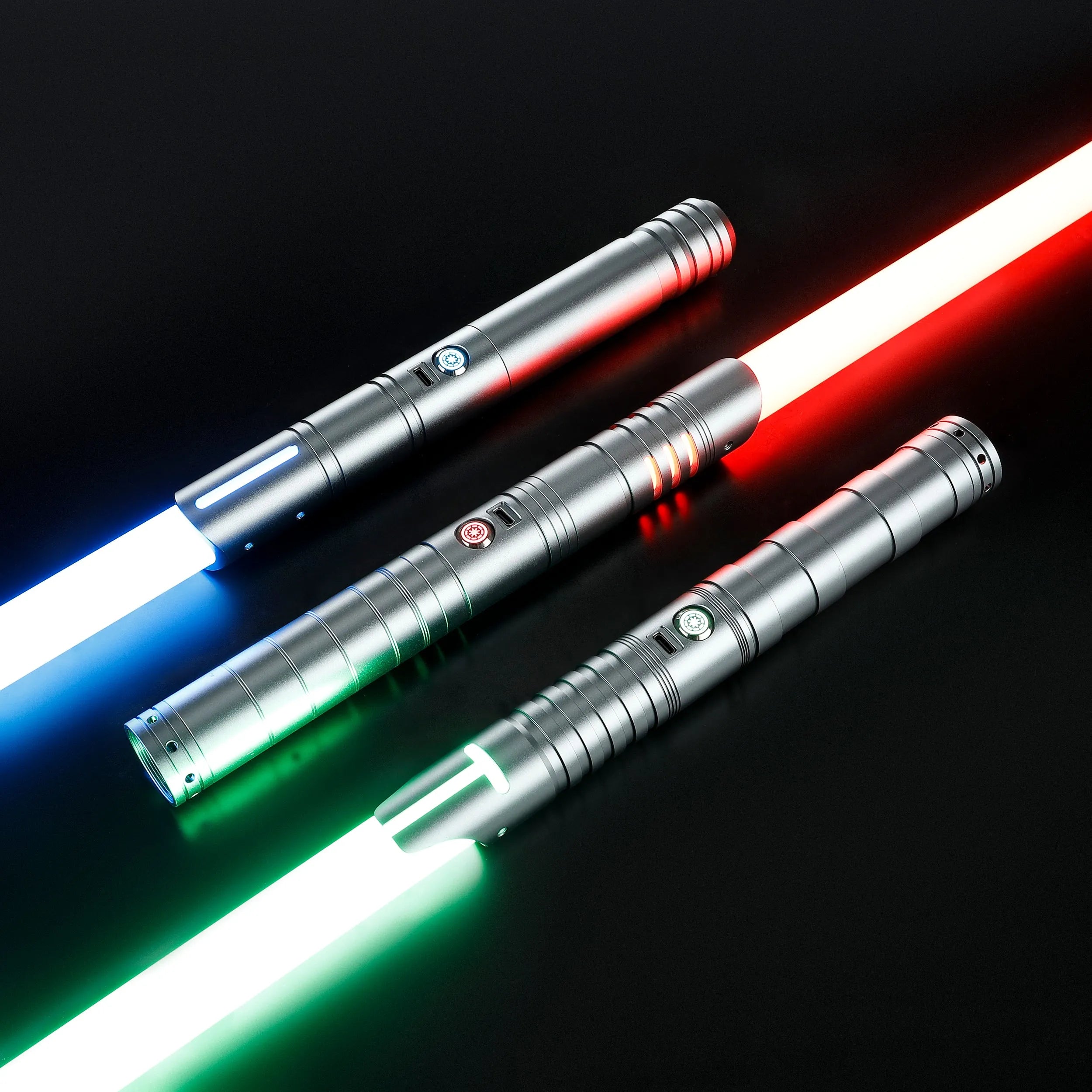 Three silver T6 aluminum alloy dueling sabers with glowing blue, red, and green baselit blades.