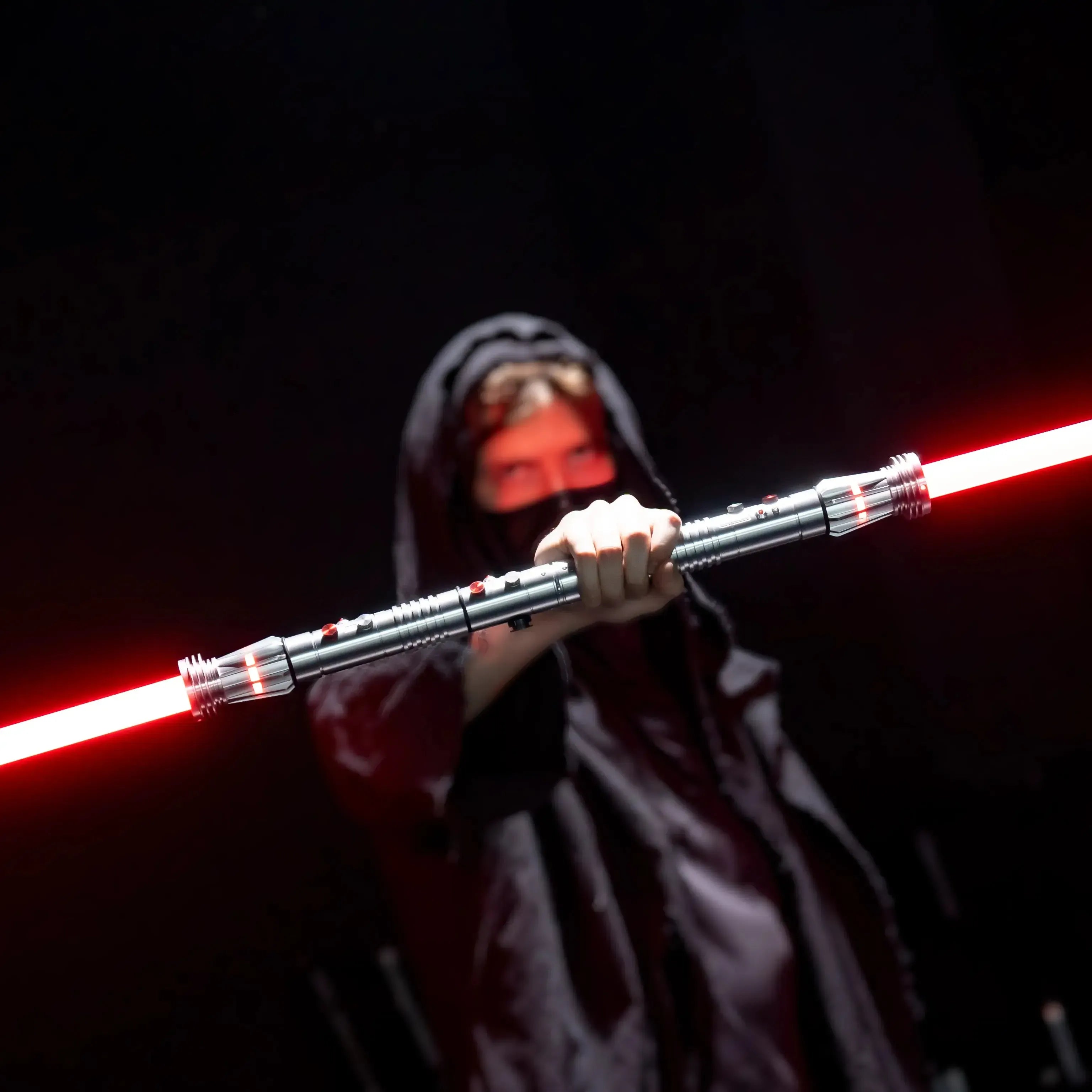 Person holding Darth Maul lightsaber Darth-Maul-Silver-Baselit,Darth-Maul-Silver-Pixel,Darth-Maul-Silver-Proffie-2_2-Neopixel