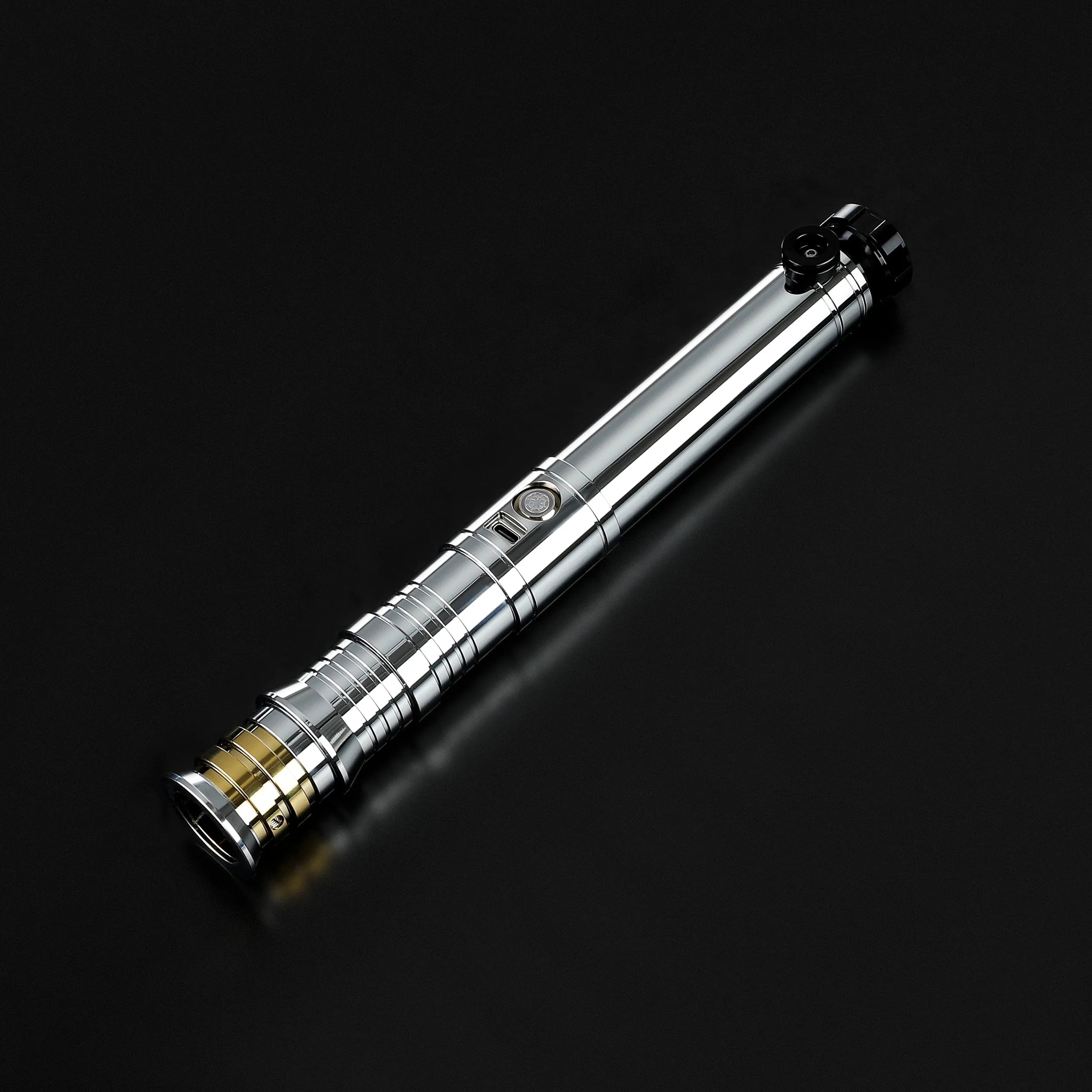 Heavy dueling screen replica of Darth Revan's lightsaber, featuring a polished silver hilt with black and gold accents.