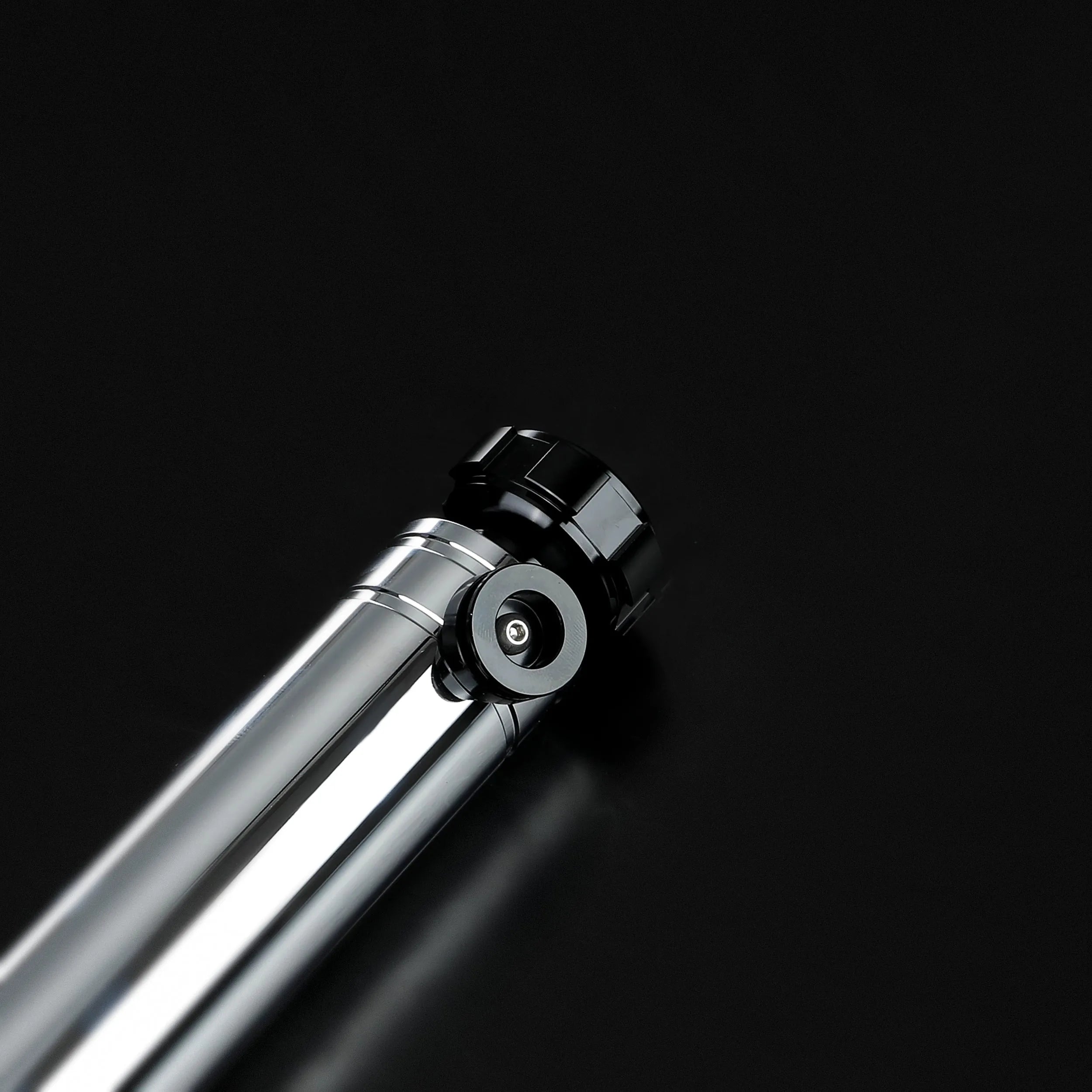 Sleek silver and black heavy dueling Darth Revan lightsaber hilt with a detailed, screen-accurate design.