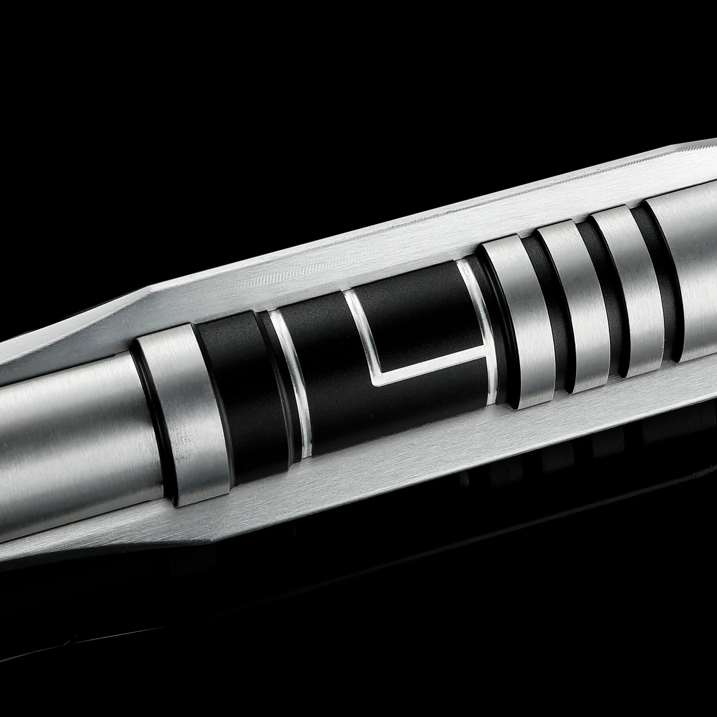Screen-accurate Jedi Revan saber hilt, silver T6 Aircraft Aluminum with black grooved sections and winged accents.