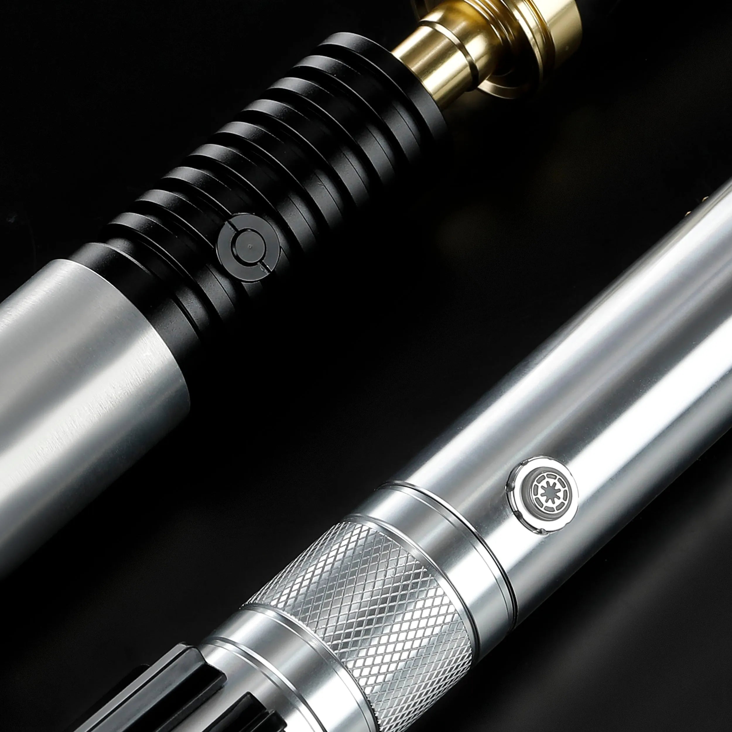 Obi-Ani two-saber bundle featuring T6 aluminum alloy hilts with detailed metallic textures and integrated activation buttons.
