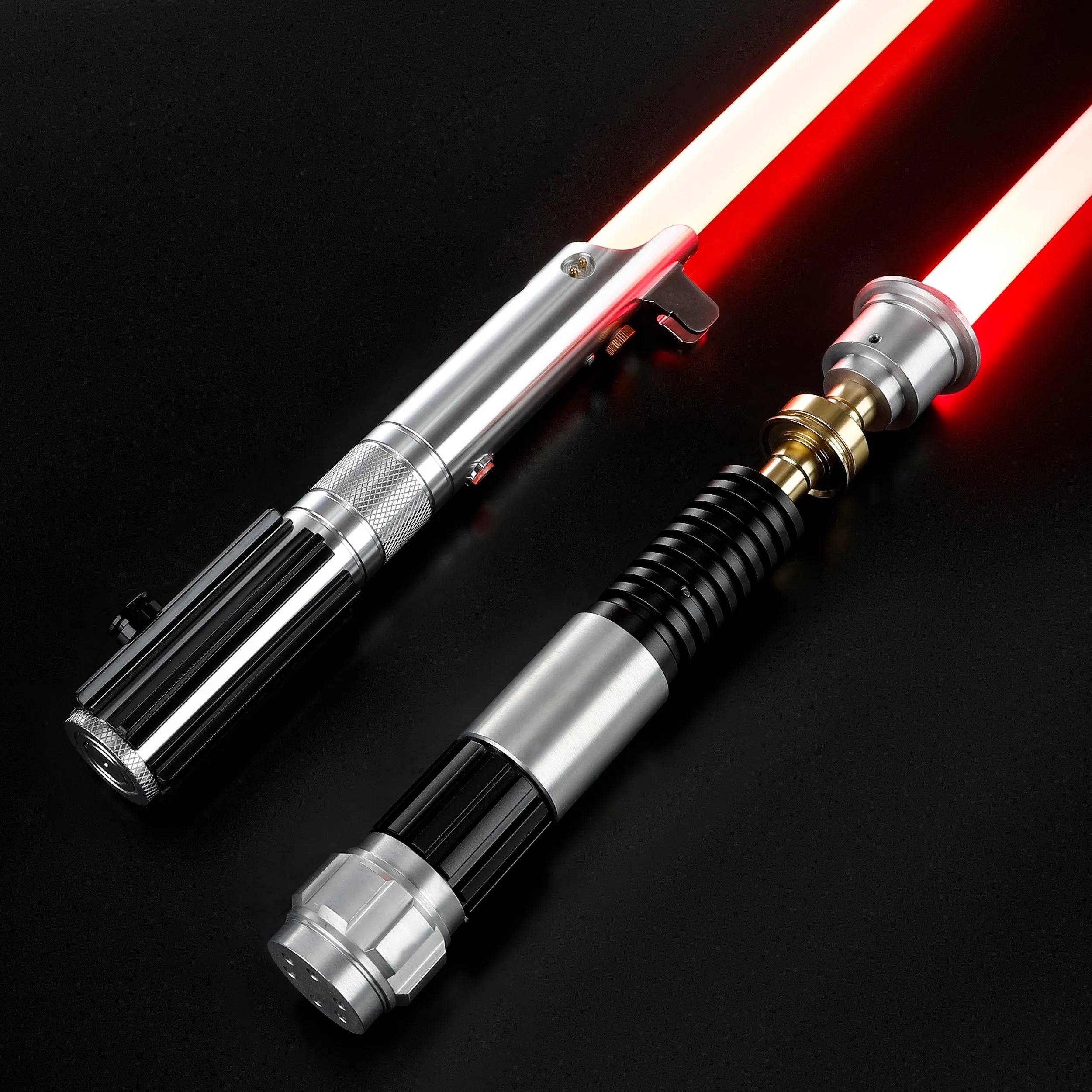 Obi-Wan and Anakin aluminum alloy lightsabers with glowing red blades and detailed metal hilts on a black background.