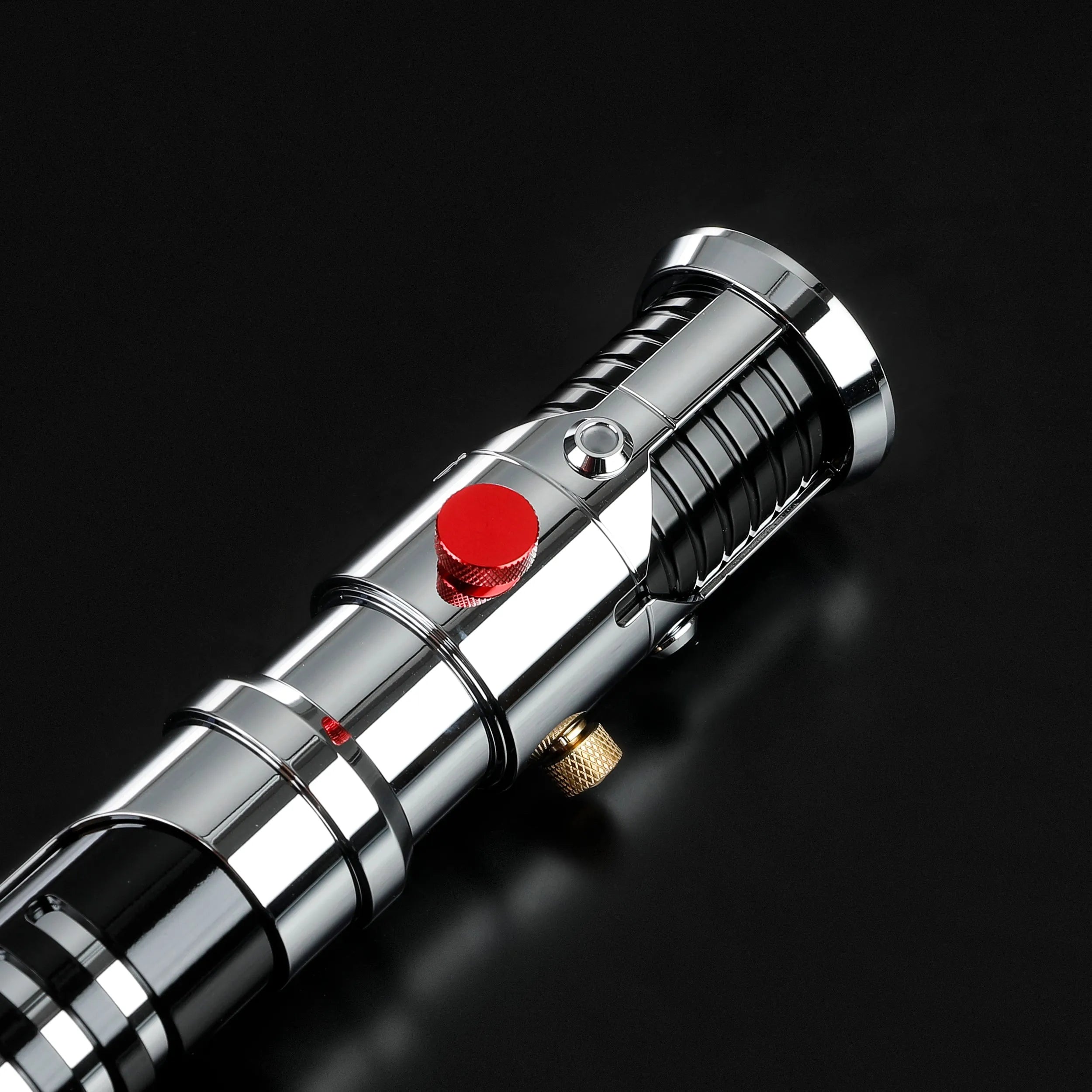 Screen-accurate Obi-Wan EP1 chrome metal lightsaber hilt with grooved grip, red activation button, and gold accents.