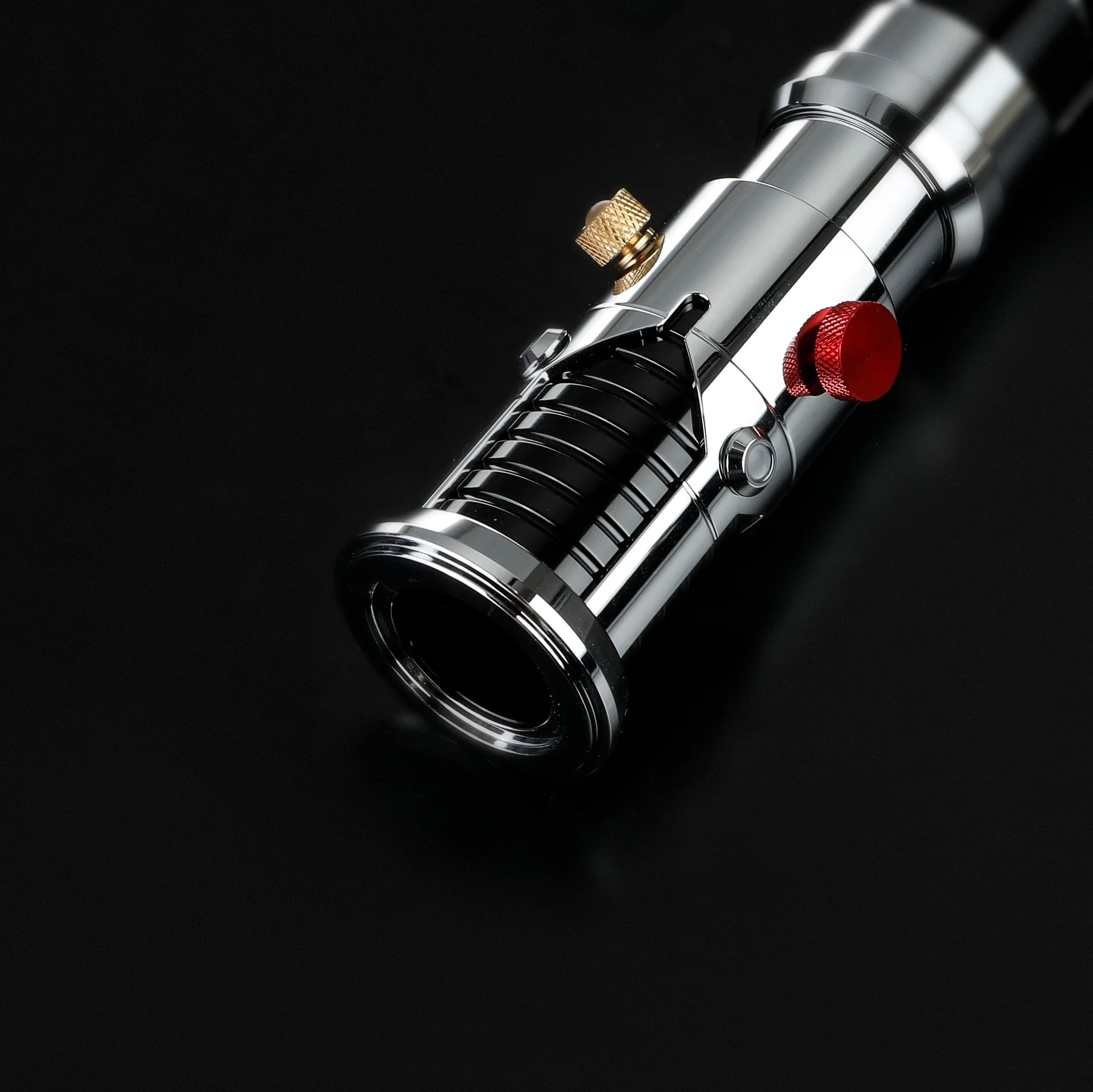 Screen-accurate Obi-Wan EP1 lightsaber hilt, chrome with black grooved grip, red button, and gold accent.