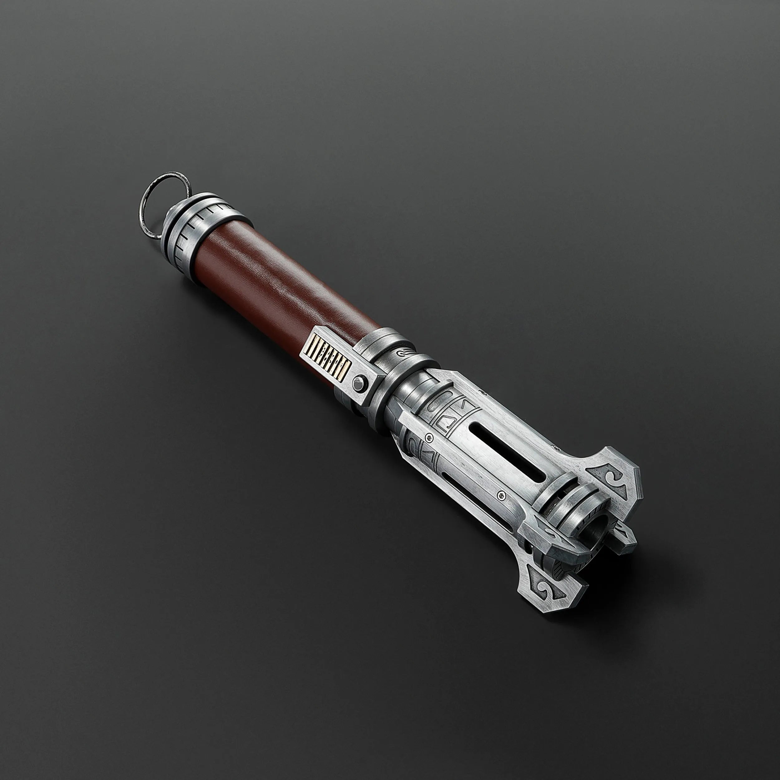 Pilgrim Ascendant Path Saber with a rich brown grip and intricately machined silver emitter.