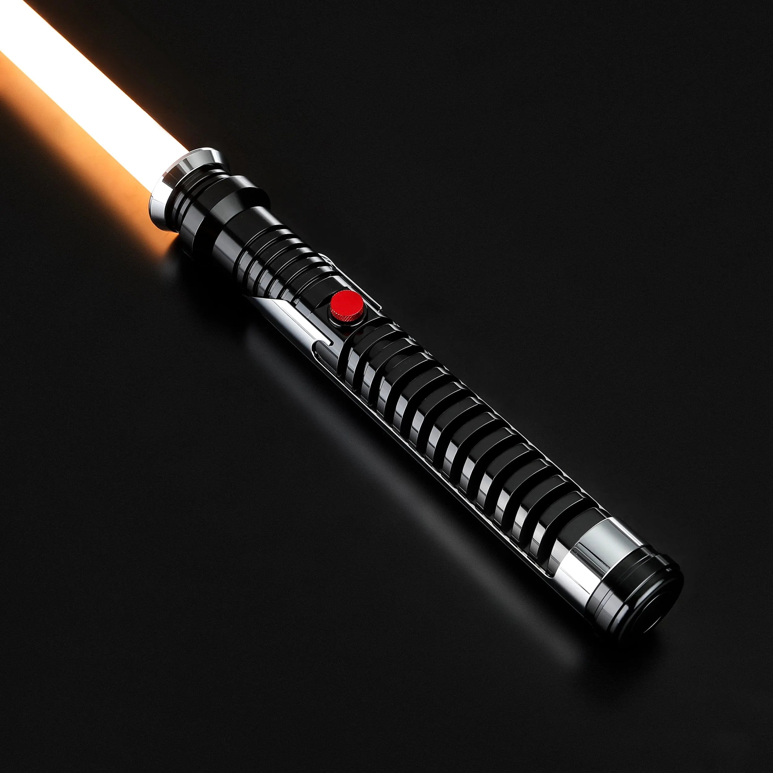 Qui-Gon Jinn's black T60 aluminum lightsaber with an orange polycarbonate blade and red activation button.