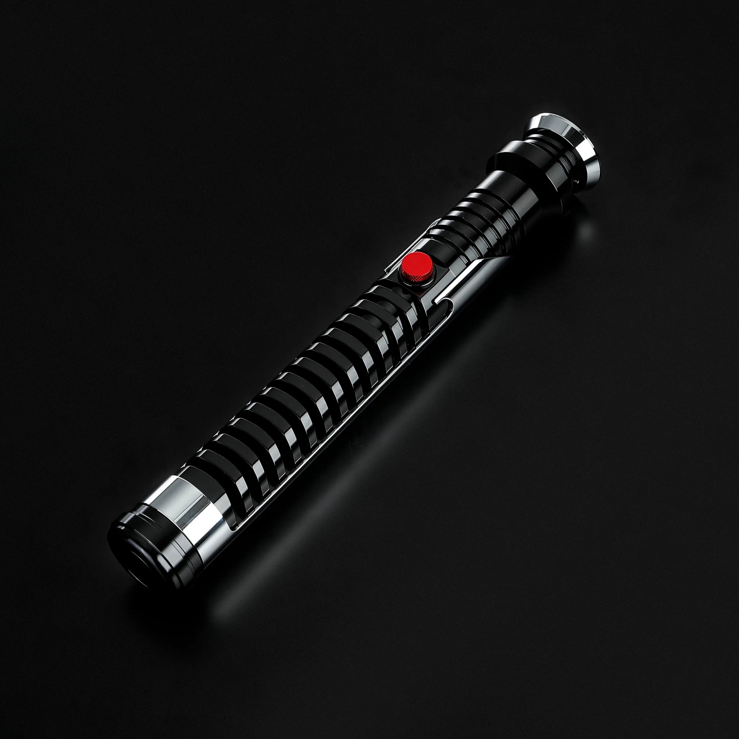 Qui-Gon Jinn lightsaber with black T60 aluminum hilt, silver accents, and a prominent red activation button.