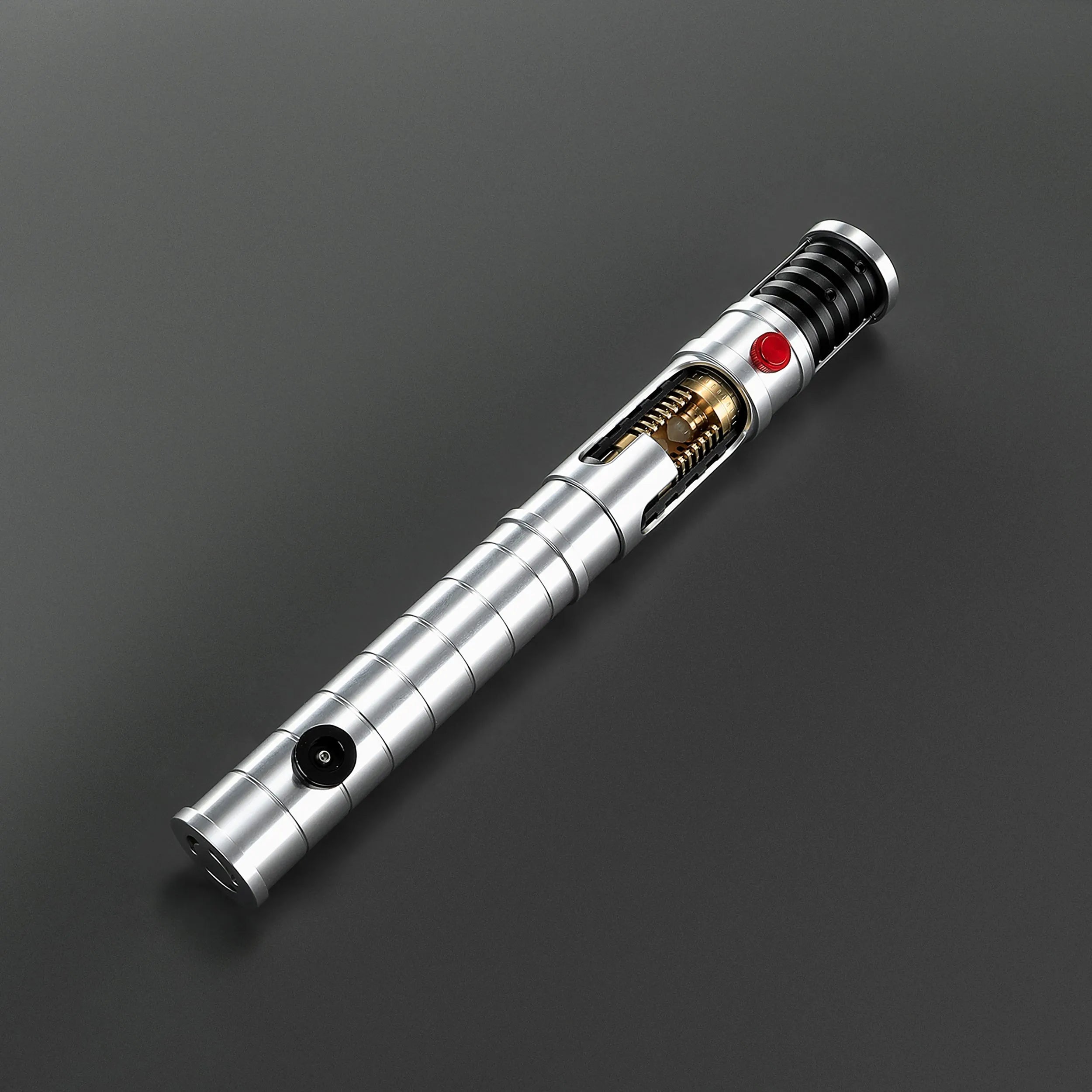 Quinlan Vos Saber: Brushed aluminum hilt with exposed kyber chamber, red and black buttons, and ribbed grip.
