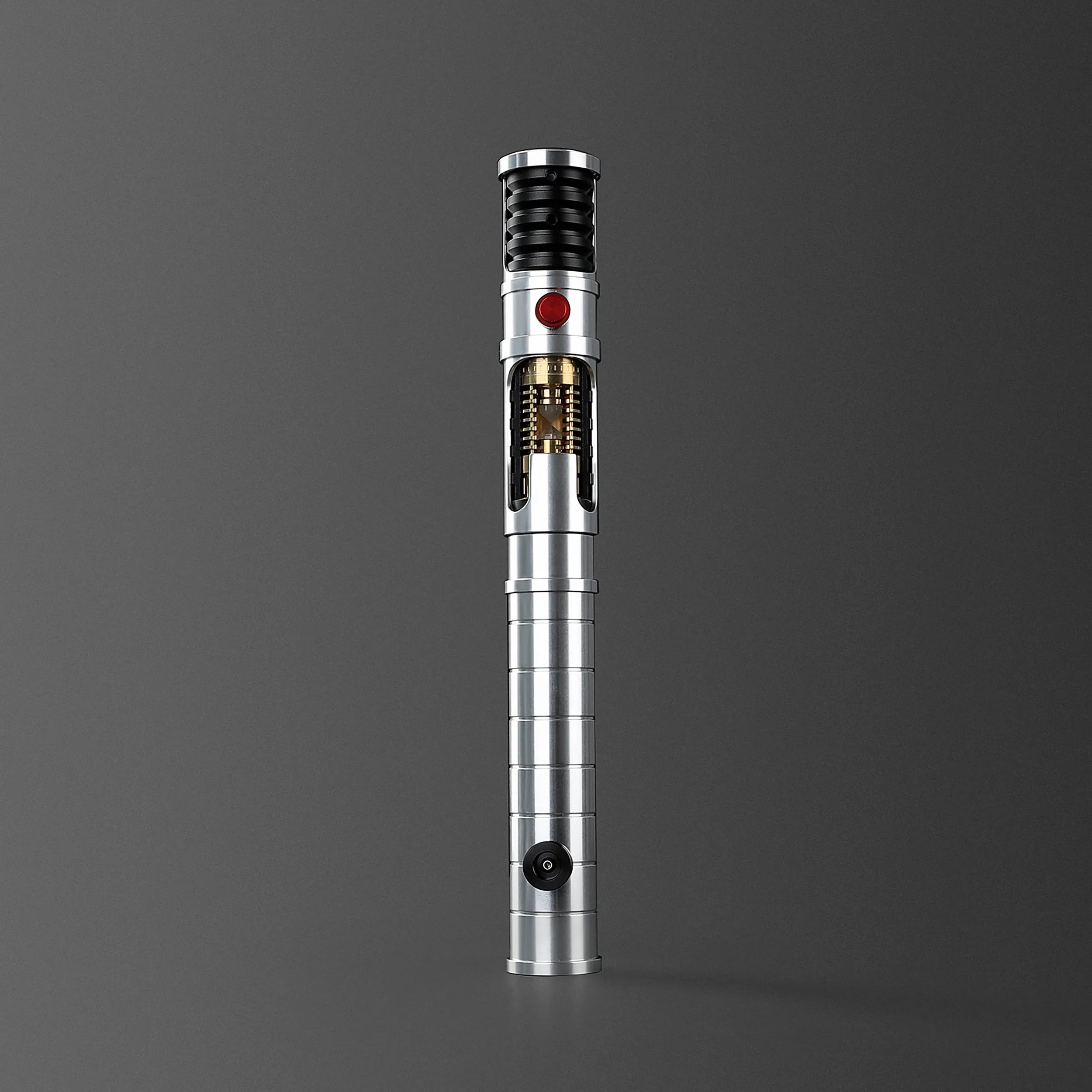 Quinlan Vos lightsaber with brushed aluminum hilt, black grip, red button, and visible kyber crystal chamber.