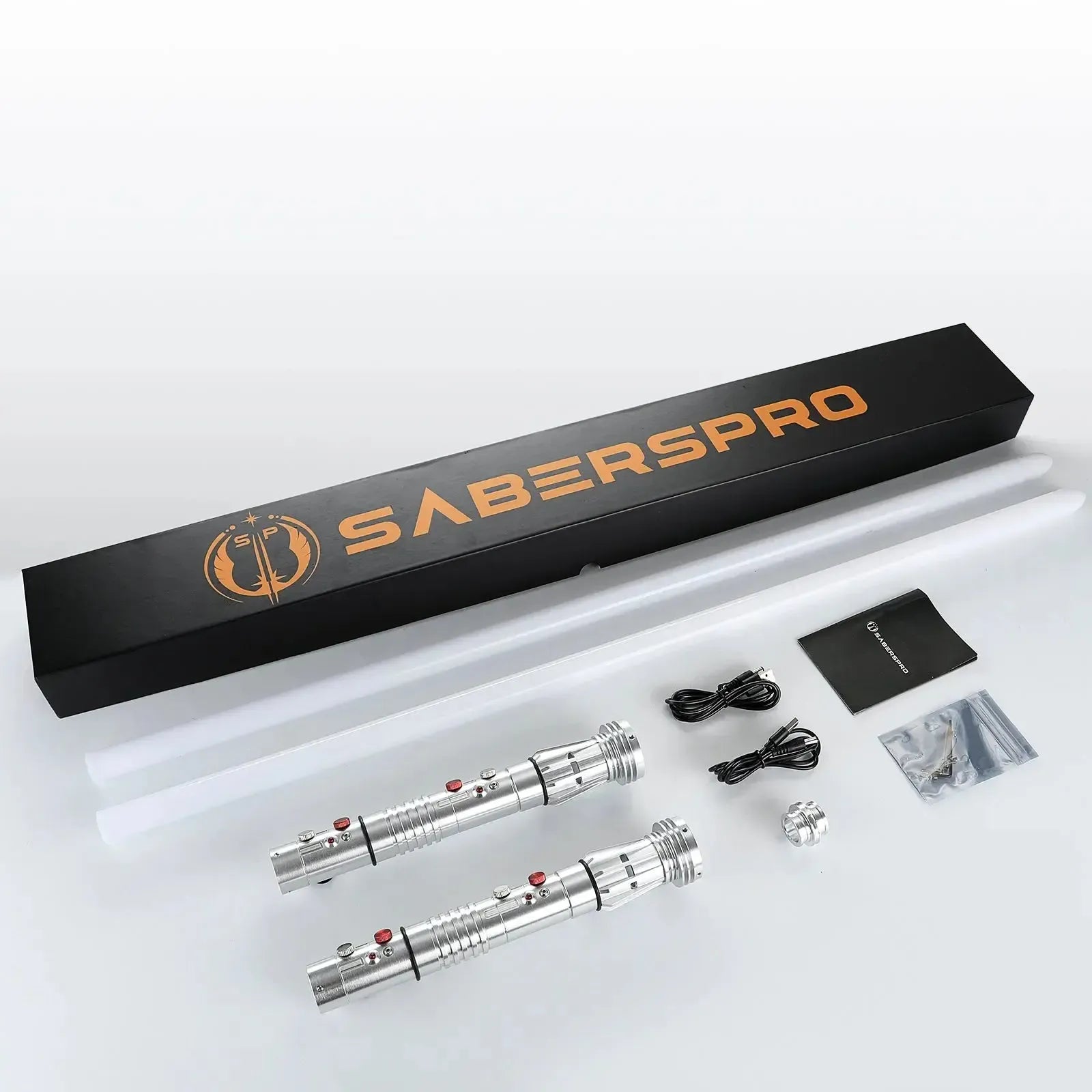 SABERSPRO lightsaber set with two lightsabers, a black box, and accessories on a white background