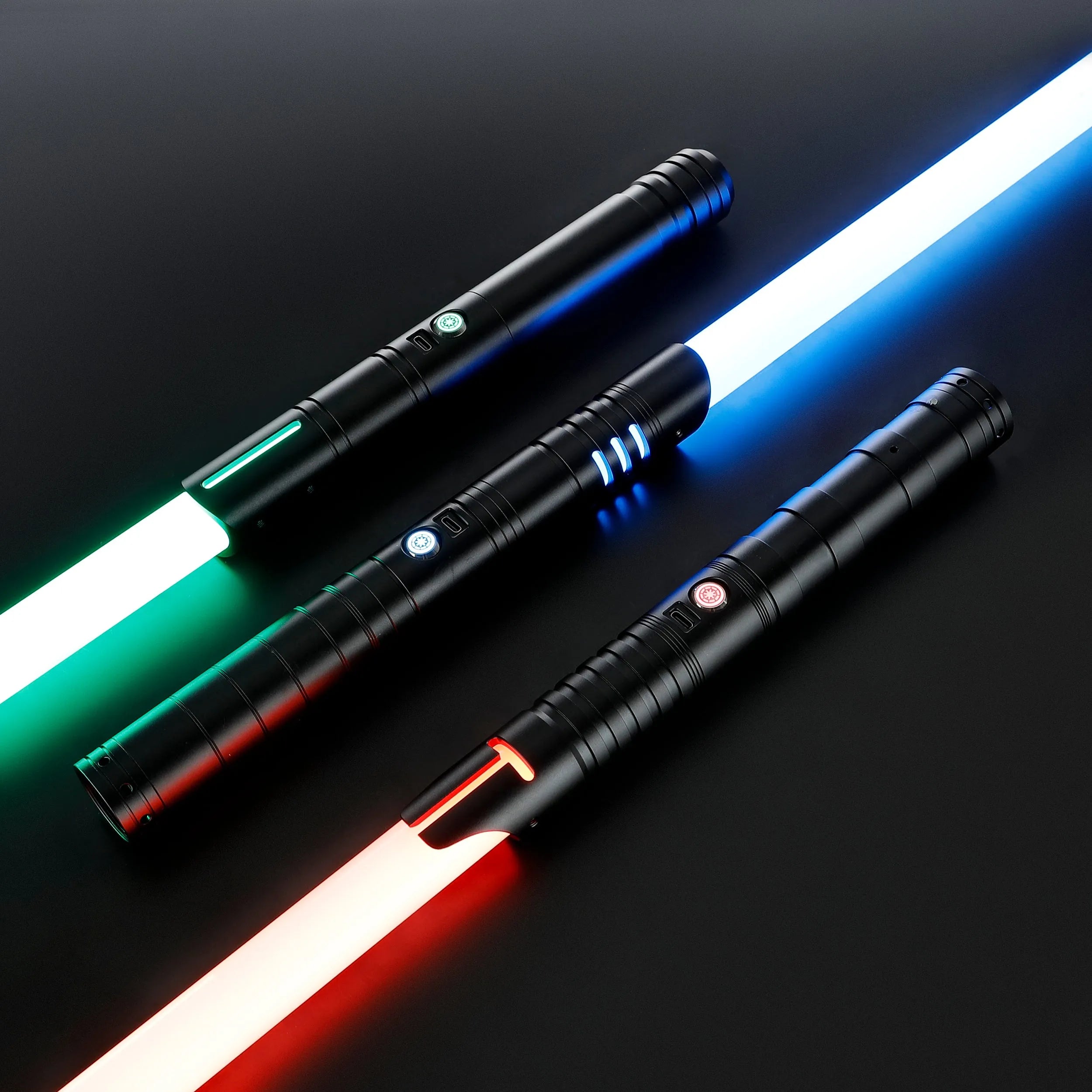 Three black T6 aluminum alloy dueling sabers with glowing green, blue, and red blades.