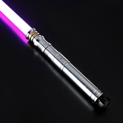 Heavy dueling Darth Revan lightsaber replica with a silver hilt, gold accents, and a glowing purple blade.