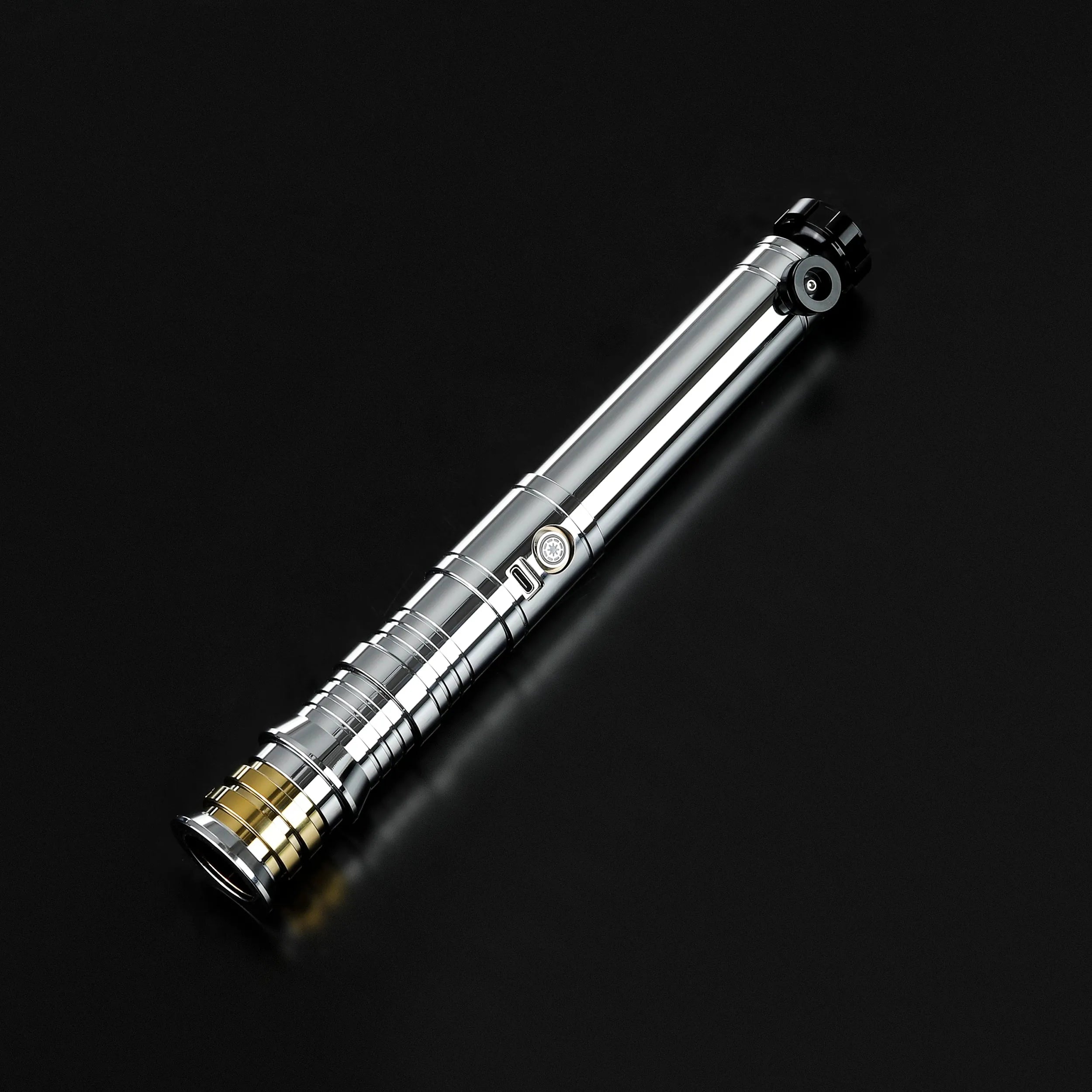 Heavy dueling Darth Revan lightsaber replica with a chrome silver hilt, black accents, and a gold pommel.