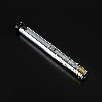 Heavy dueling Darth Revan lightsaber replica with a polished chrome hilt, black accents, and a gold pommel.