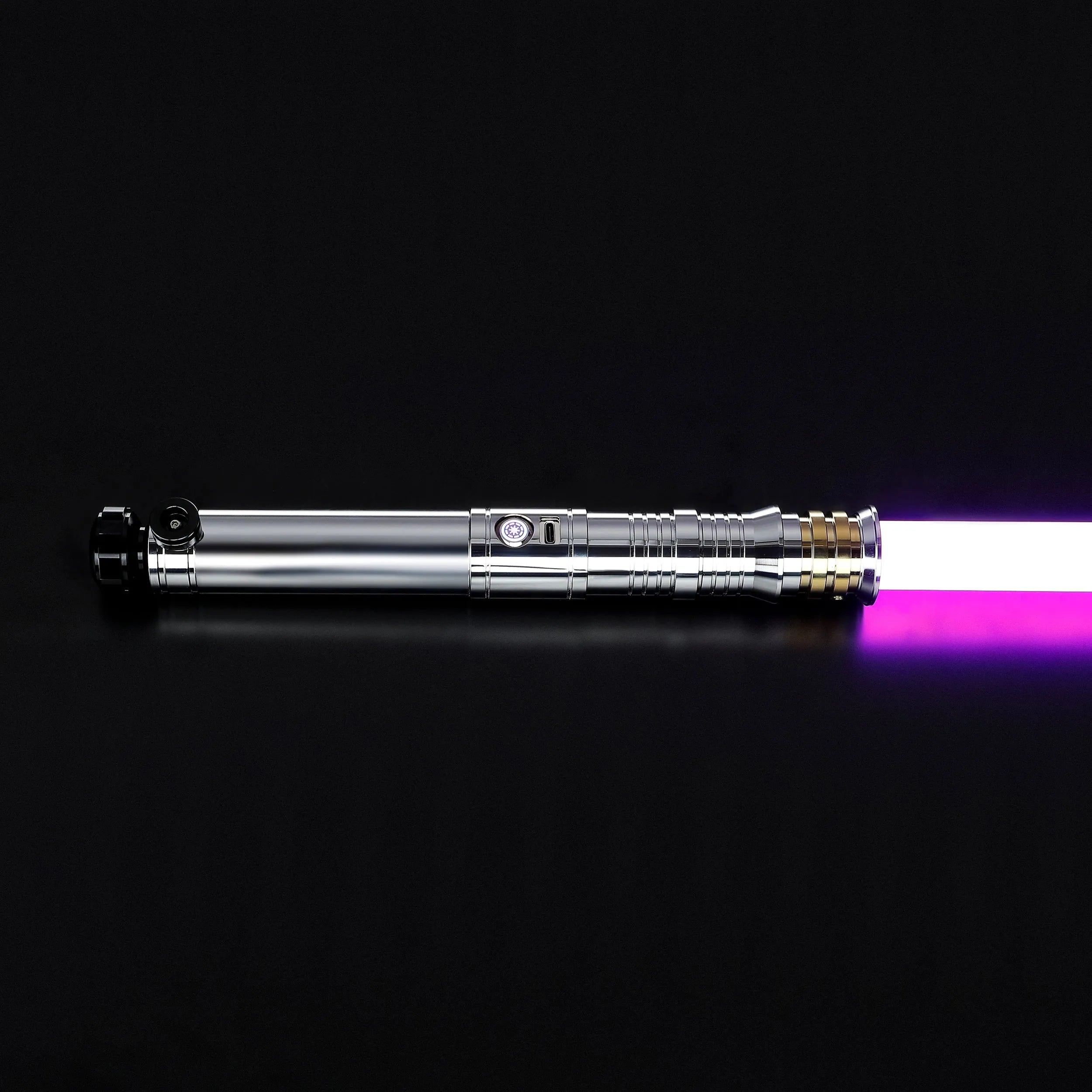 Heavy dueling Darth Revan lightsaber replica with a silver hilt, gold accents, and a vibrant purple blade.