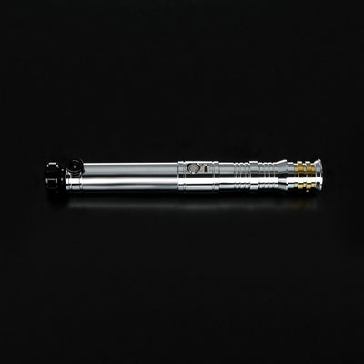 Heavy dueling Darth Revan lightsaber replica with a silver hilt, gold accents, and black grip details.