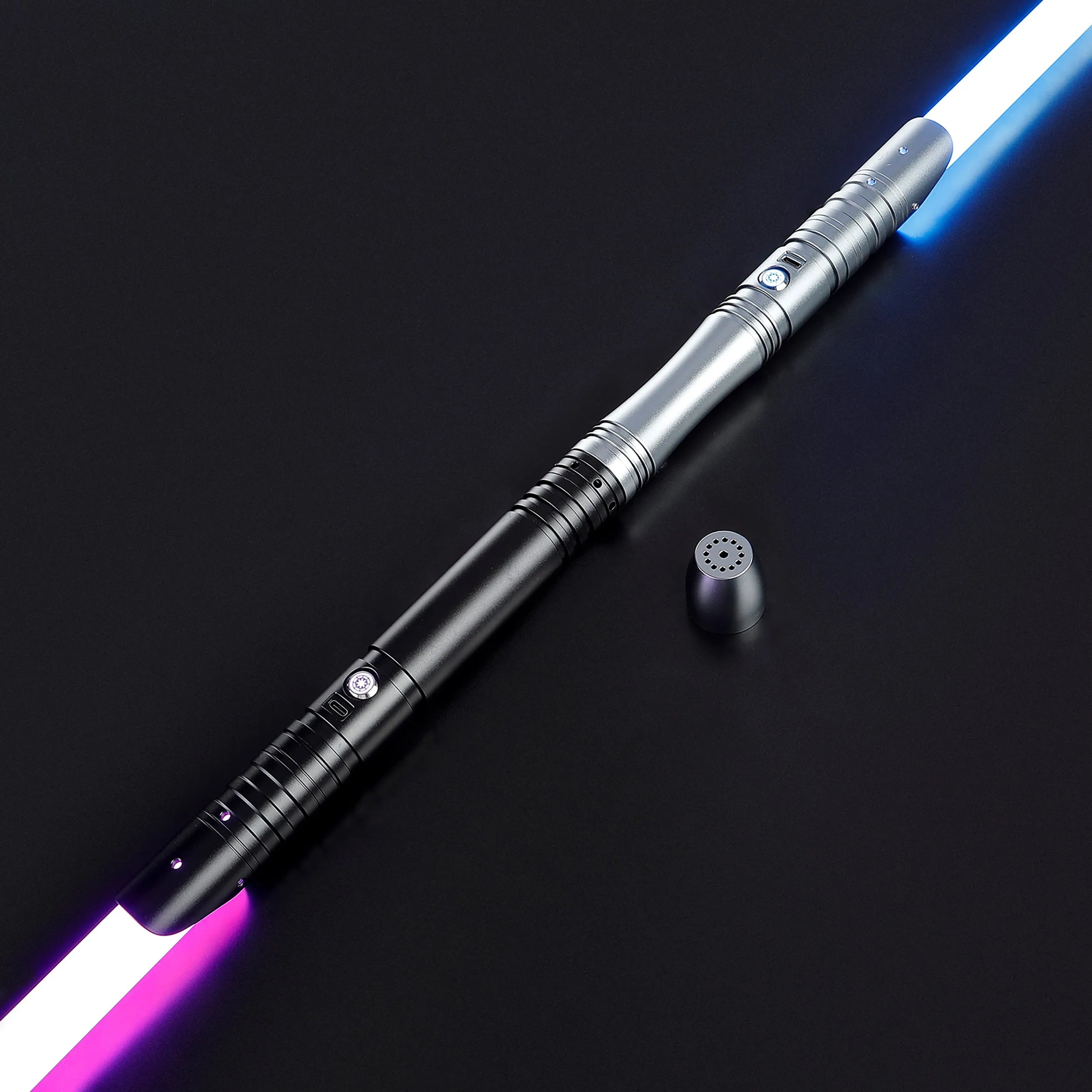 Two aluminum alloy sabers, one with a blue blade and one with a purple blade, on a dark background.