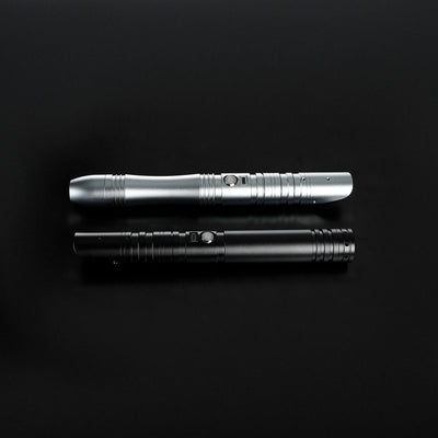 Two aluminum alloy saber hilts, one silver and one black, with buttons and textured grips.