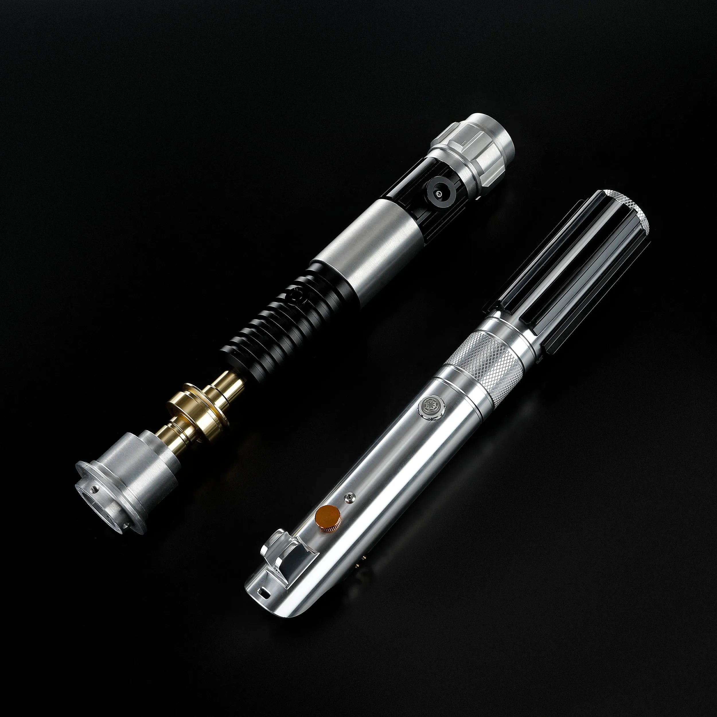 Two Obi-Wan and Anakin aluminum alloy lightsaber hilts with detailed metallic finishes on a black background.