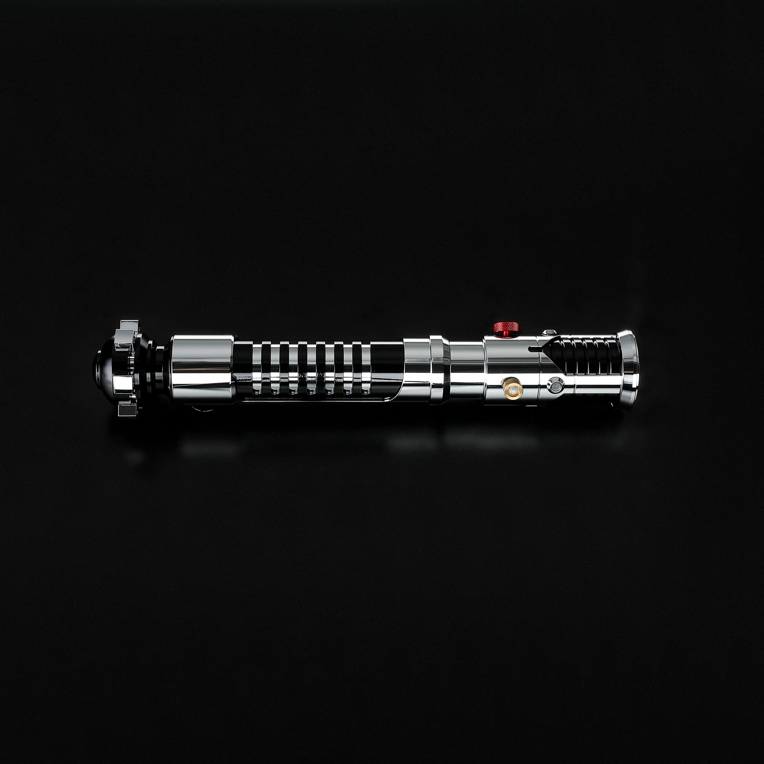 Screen-accurate Obi-Wan EP1 chrome hilt lightsaber with grooved grip, red and gold buttons, durable for dueling.