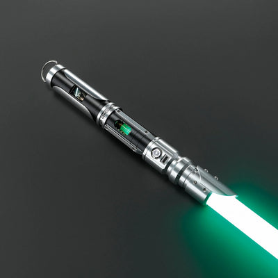 Paragon Xenopixel V3 saber with polished silver and black aircraft-grade aluminum, exposed green kyber crystal, and glowing green blade.