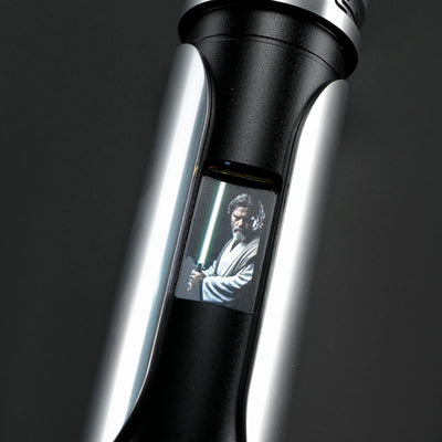 Paragon Xenopixel V3 saber hilt with polished silver and black aircraft-grade aluminum, featuring an OLED display.