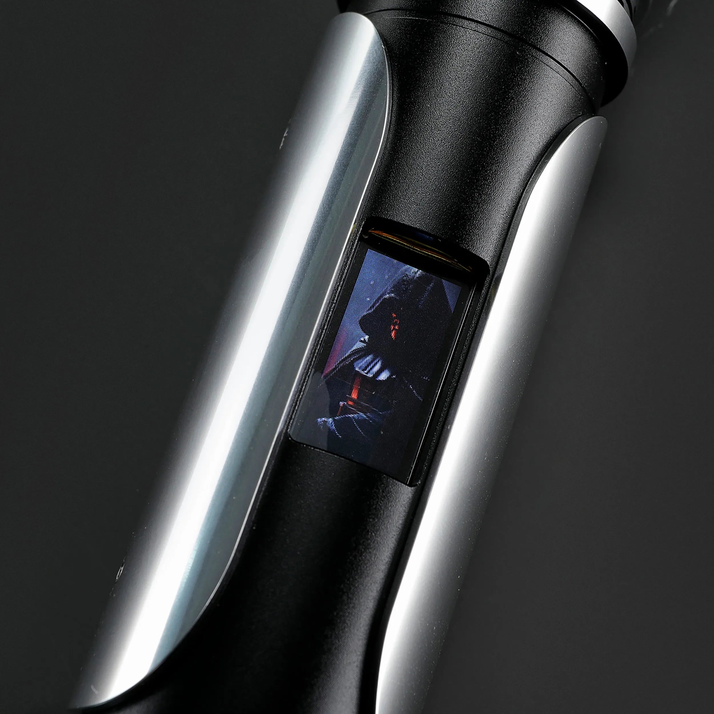 Paragon Xenopixel V3 saber hilt with polished silver and black aircraft-grade aluminum, featuring an OLED display.
