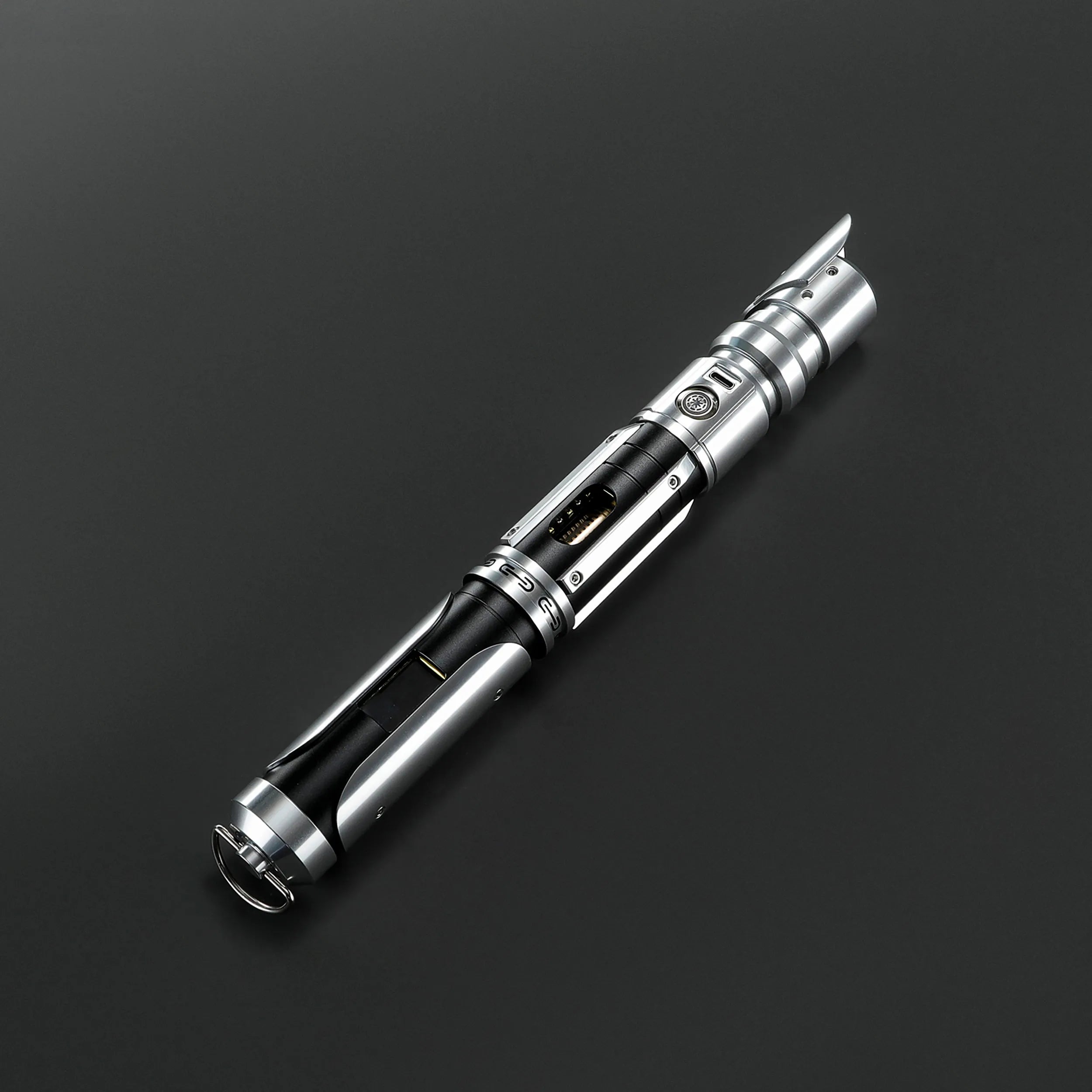Paragon Xenopixel V3 saber, aircraft-grade aluminum, polished silver and deep black, exposed kyber crystal chamber.