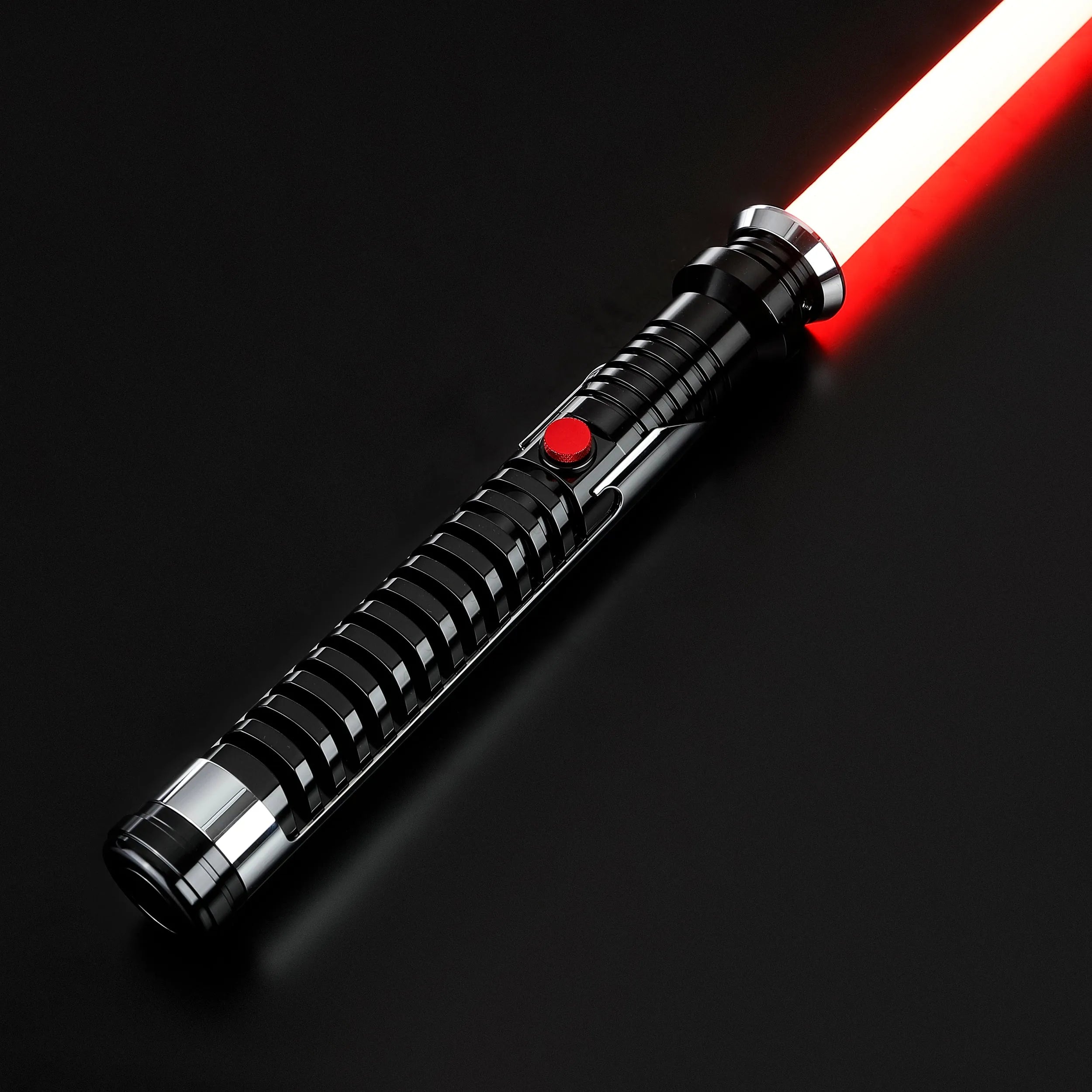 Qui-Gon Jinn's black T60 aluminum lightsaber with a red button and glowing red polycarbonate blade.