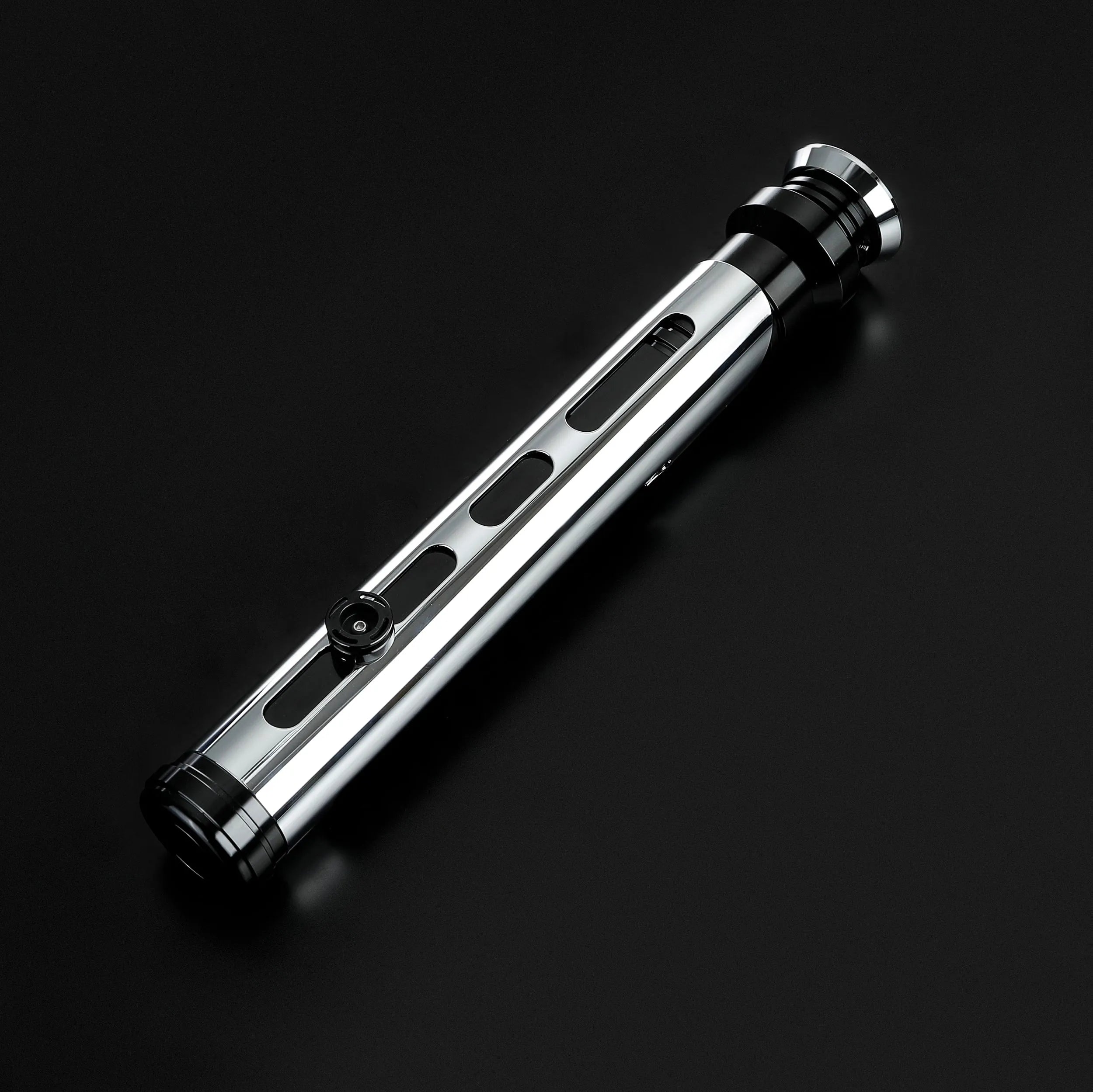 Qui-Gon Jinn lightsaber hilt, shiny T60 aluminum with black accents, on a dark background.