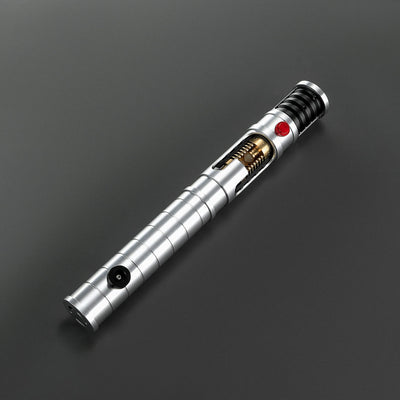 Quinlan Vos Saber: Brushed aluminum hilt with exposed kyber chamber, red and black buttons, and ribbed grip.