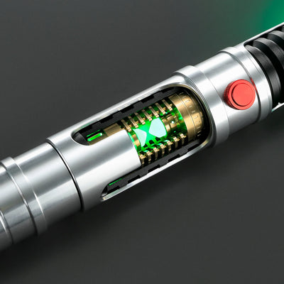 Quinlan Vos Saber: Brushed aluminum hilt with visible green kyber crystal chamber and red activation button.