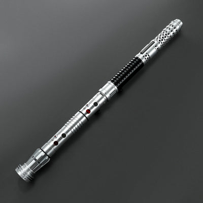 Brushed silver metal Shadow Lord saber hilt with black grip and red buttons, designed for dual-blade combat.