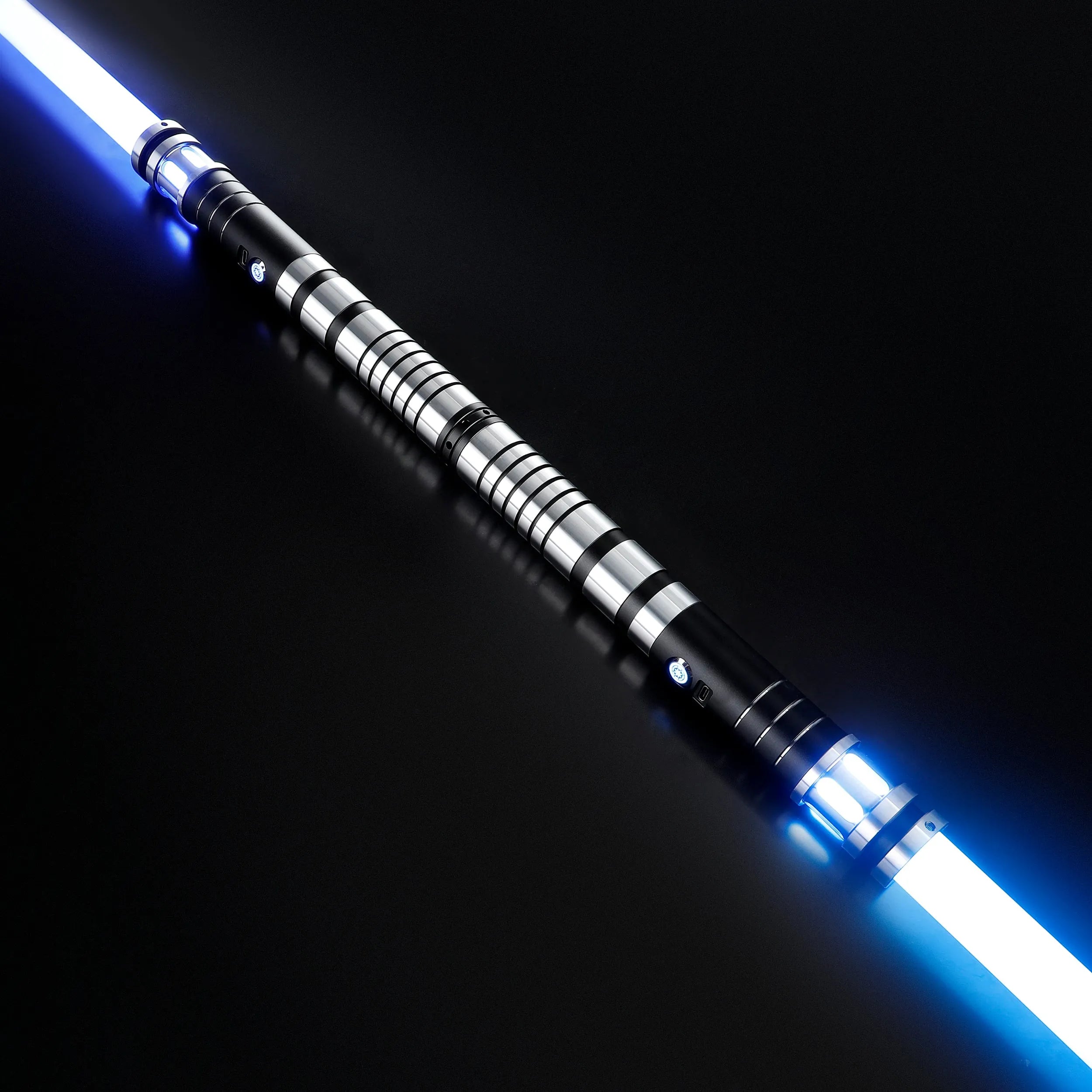 Sol double-bladed lightsaber bundle with a sleek black and silver aluminum hilt and glowing blue polycarbonate blades.