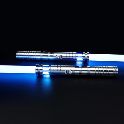 Two silver T6 aluminum Sol lightsabers with glowing blue polycarbonate blades on a black background.