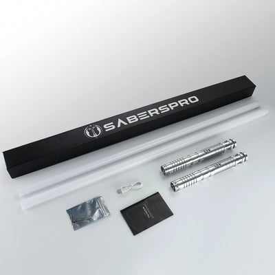 Sol bundle with two silver T6 aluminum lightsaber hilts, polycarbonate blades, charging cable, and manual in a box.